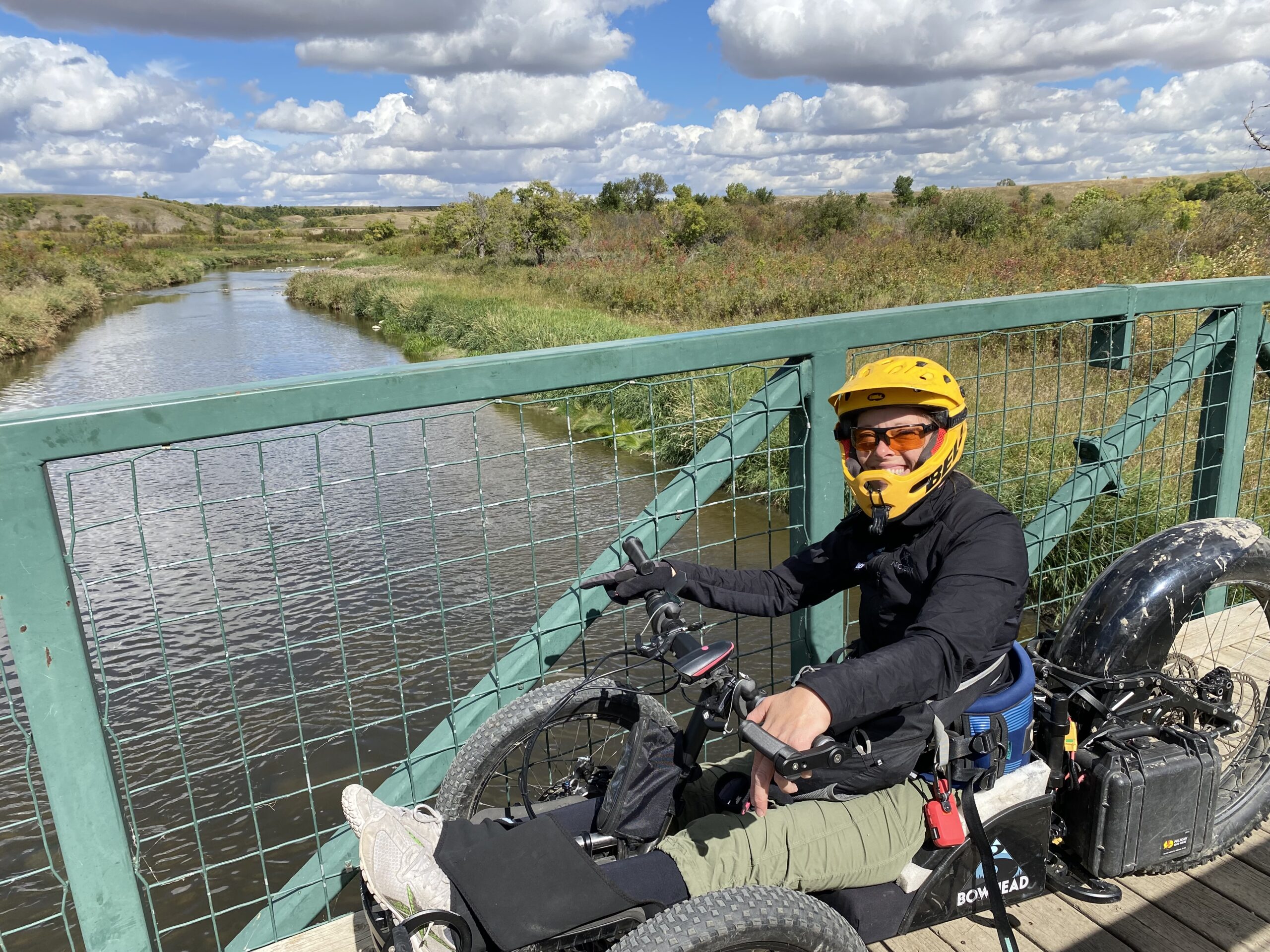 Lisa Franks on an adaptive mountain bike on Wascana Creek Trail bridge
