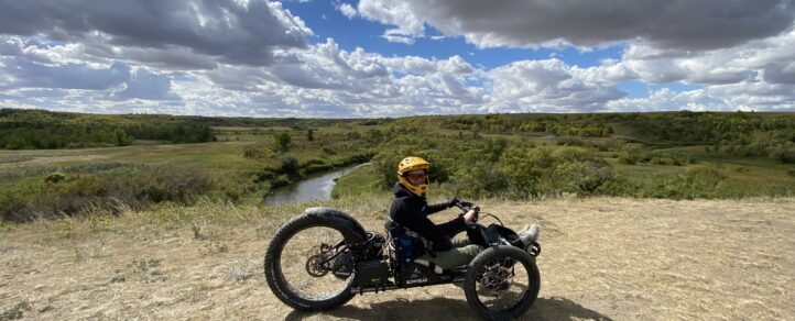 Lisa Frank riding an adaptive mountain bike