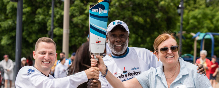 Eleanor McMahon and volunteers holding torch at the Niagara 2022 Canada Summer Games Torch Relay