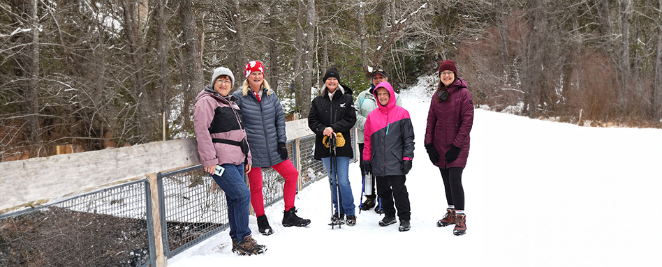 A group of women on a winter hike, a part of the "Women of the Wilderness" 