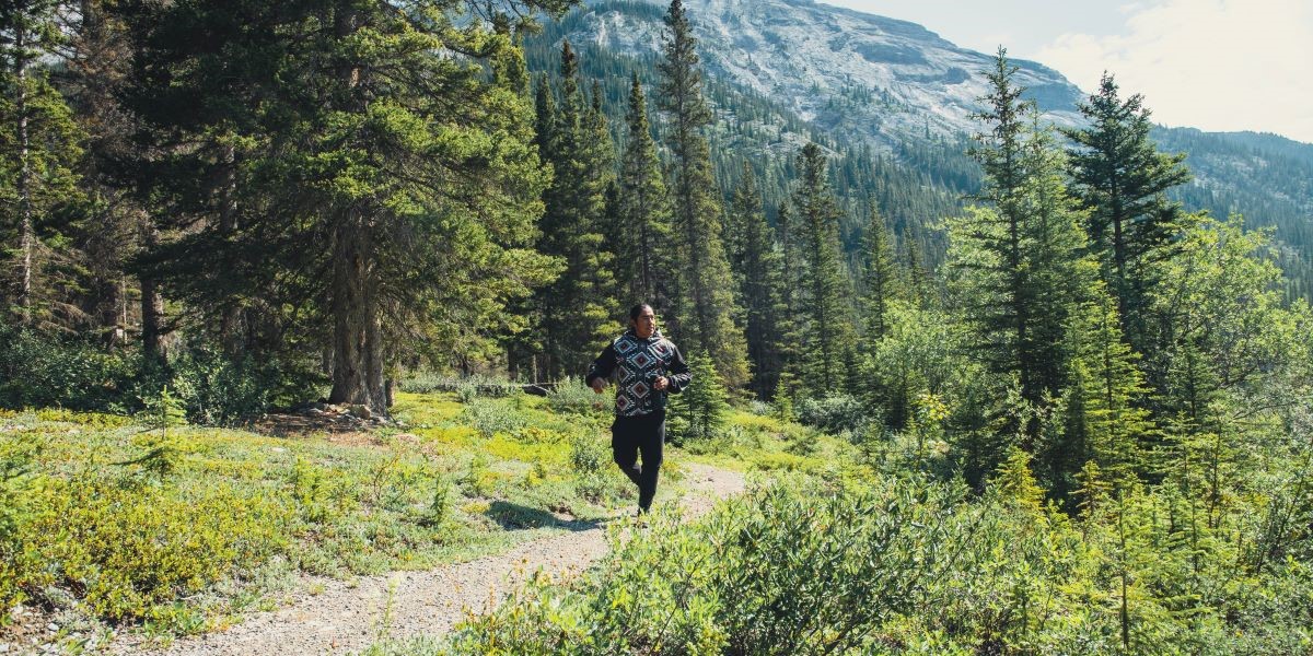 A person walks on the High Rockies Trail near 