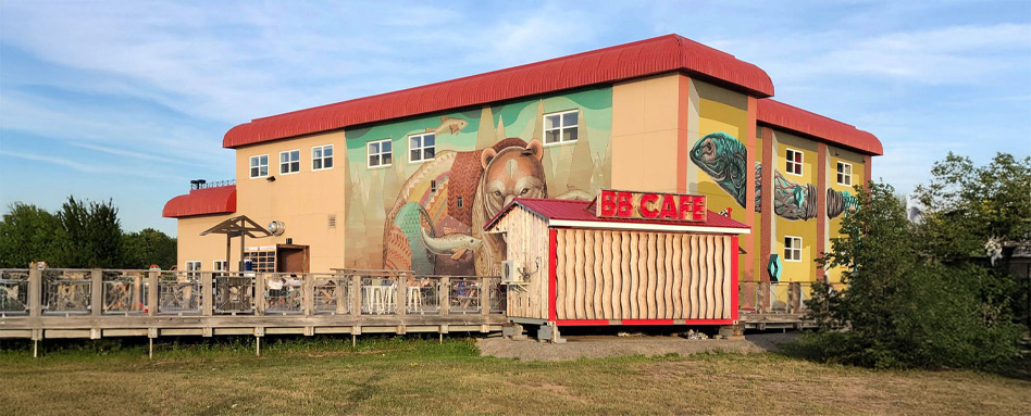 Fundy Hiking Trails | Sentier Transcanadien building with painting of wildlife in a field