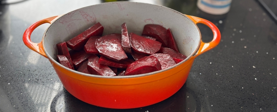 beets sitting in a dutch oven on counter