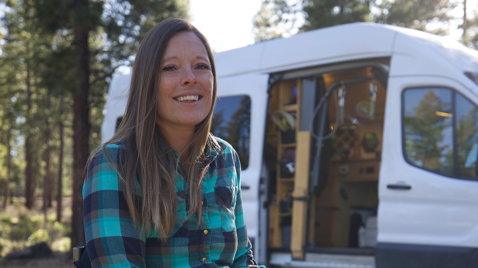 Lisa Franks in front of her custom-designed camper van.
