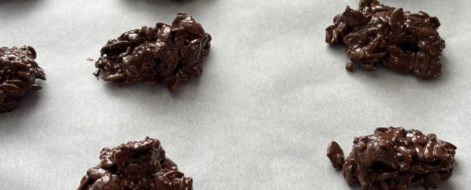 chocolate clusters on parchment paper