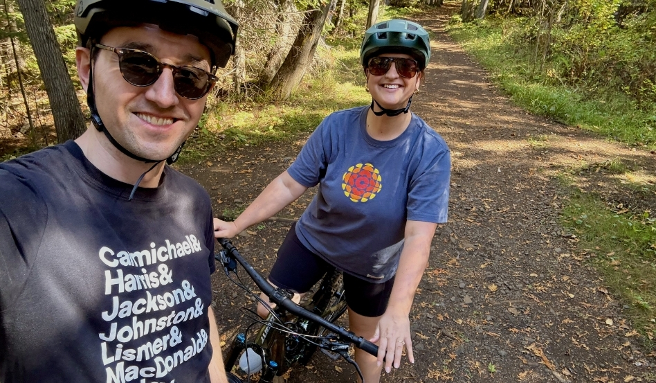 selfie of man and woman on bikes