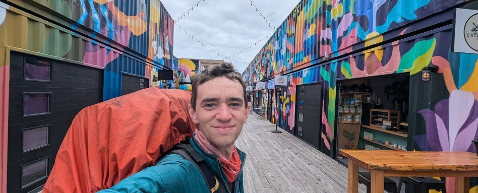 selfie of a person in a marketplace