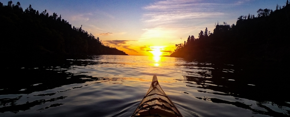 kayak at sunset on a lake