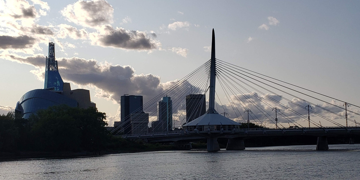 large bridge on the water at sunset