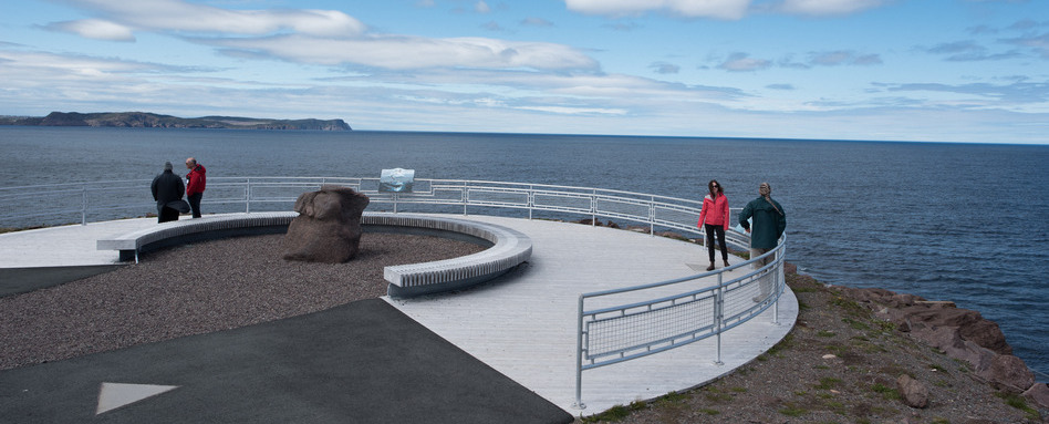 child standing at water lookout