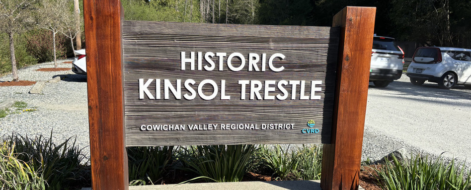 wooden trail bridge signage